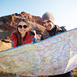 young couple looking at map
