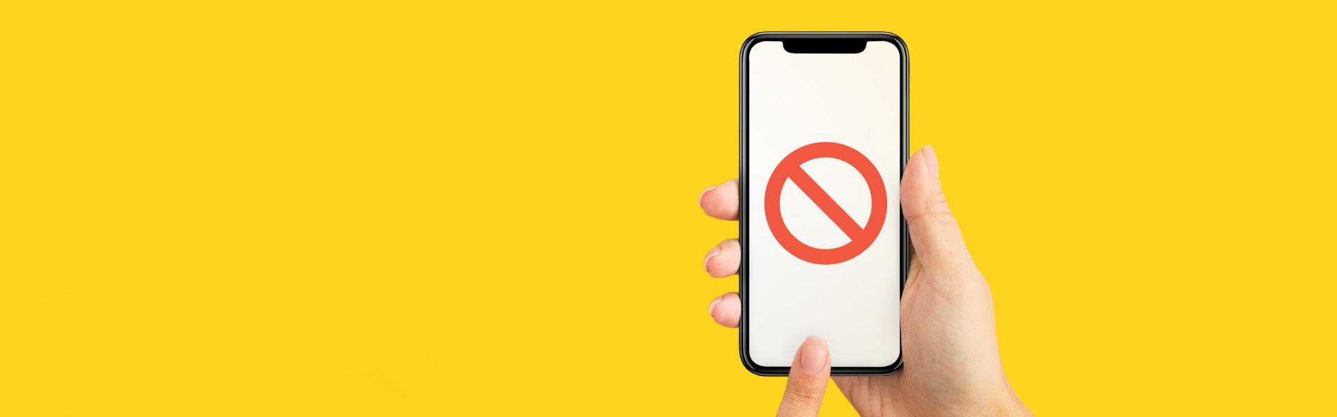cell phone with a no symbol